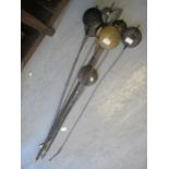 Nine various longcase clock pendulums