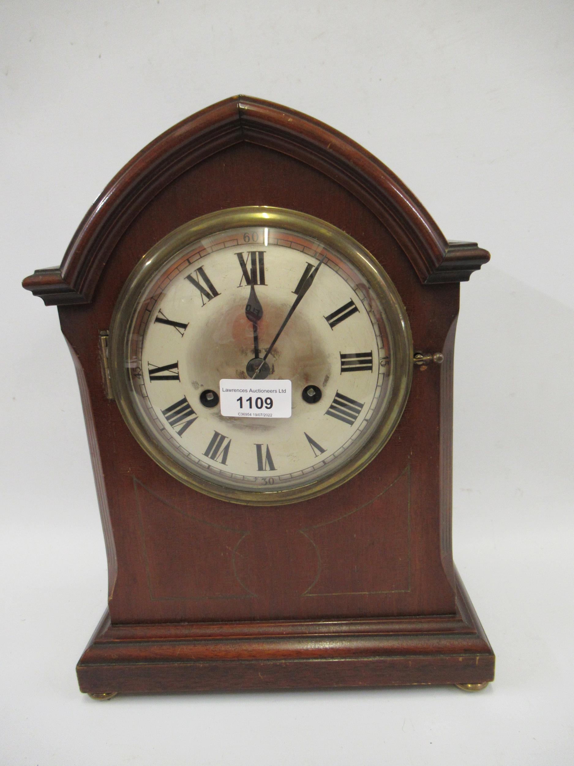 Large Edwardian mahogany marquetry inlaid arched top mantel clock, the enamel dial with Roman