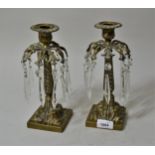 Pair of small Regency brass candlesticks with glass prismatic drops (some damages), 9.5ins high