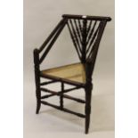 Unusual 19th Century mahogany Turner's corner chair with cane seat