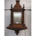 Victorian oak Gothic revival bracket clock with bracket, the silvered dial inscribed Howell