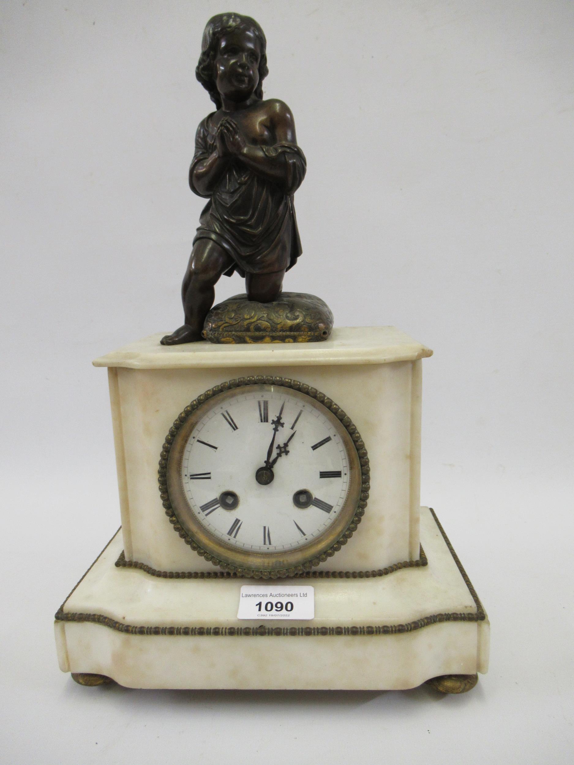 19th Century French alabaster and gilt metal mounted two train mantel clock with a bronze figural