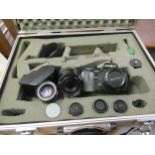 Minolta model 1000 camera with accessories, in aluminium case