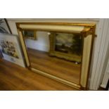 Reproduction gilt and cream lacquered bevelled edge wall mirror, 39ins x 49ins
