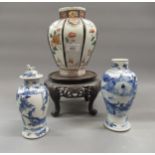 Japanese Imari octagonal baluster form vase, 7.75ins high (at fault), together with two small