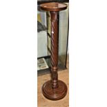 19th Century carved mahogany bedpost torchere