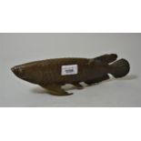 20th Century patinated bronze figure of an Arowana lucky fish, 11ins long