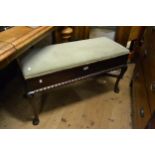 Late 20th Century mahogany duet boxseat piano stool on shell carved cabriole pad supports, 20ins