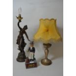 Reproduction painted cast iron Uncle Sam money box, a plated table lamp and a bronzed composition