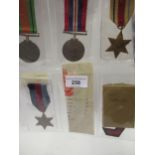 Group of four World War II medals including Africa star with army bar