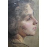 Early 20th Century oil on canvas laid on board, head study of a young lady, gilt framed, 13ins x