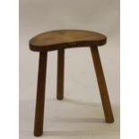 Robert (Mouseman) Thompson, an oak stool, the adze carved kidney shaped top with mouse signature,