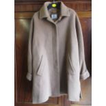 Ladies tan woollen coat by Viyella (size 10), a wool jacket (size 12, maker's label removed), a pink