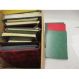 Box containing collection of thirteen albums of various stamps including United States,