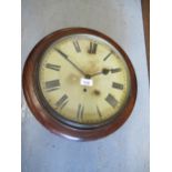 An oak circular wall clock, the 11 inch painted dial with Roman numerals and single train movement