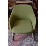 Mid 20th Century green textile tub shaped chair on shaped chromium supports