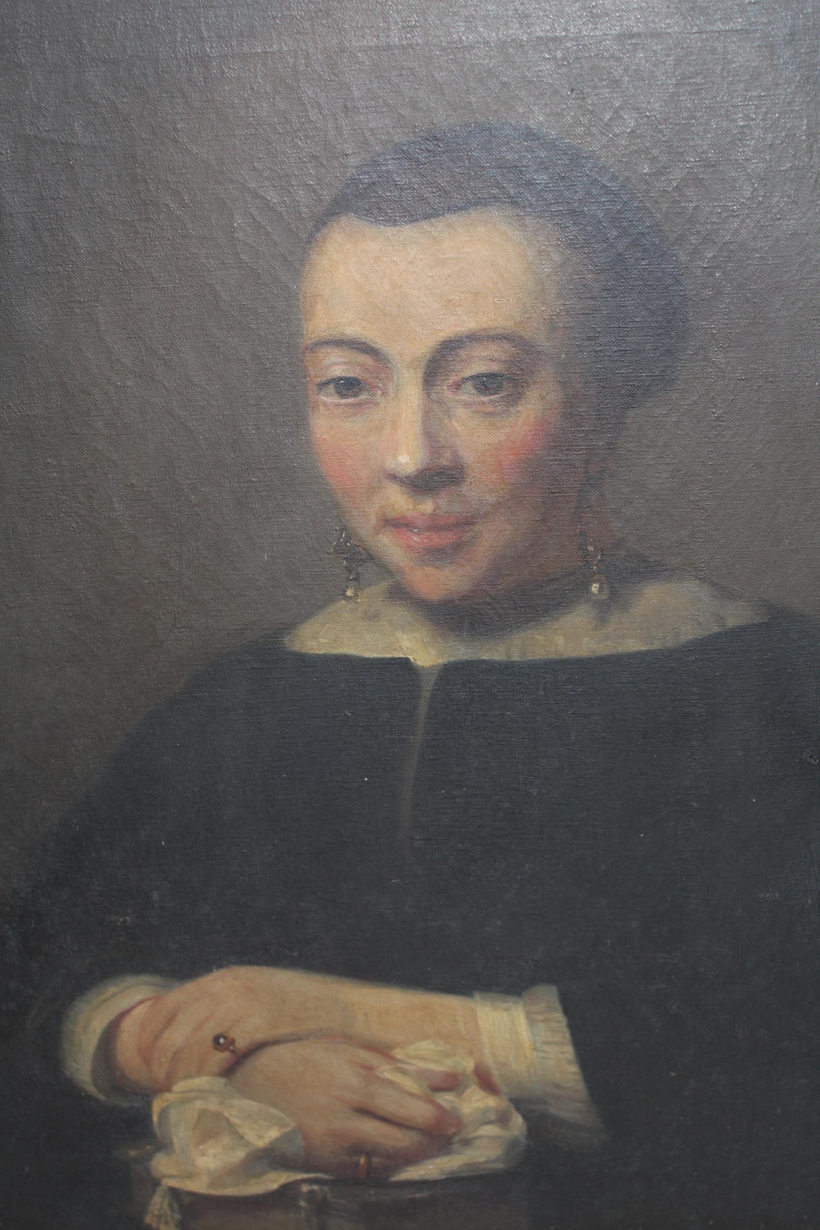 An antique oil on canvas, portrait of a 17th Century Dutch lady, gilt framed 26.5ins x 23ins Small