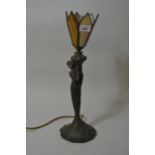 Bronzed Art Deco style resin table lamp, with coloured glass shade
