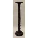 19th Century carved mahogany bedpost torchere
