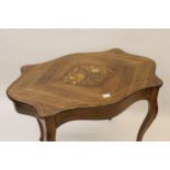 19th Century French rosewood line and marquetry inlaid centre table, the shaped top above a shaped