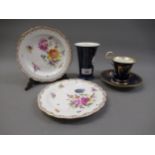 Pair of Meissen seconds floral decorated plates, 7ins diameter together with a Meissen cabinet cup