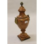 18th / 19th Century rouge marble and ormolu mounted pedestal urn, the gilt finial above a pair of