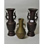 Pair of late 19th / early 20th Century Japanese bronze two handled baluster form vases, 13.75ins