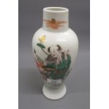 Chinese famille verte baluster form vase, decorated with figures in a landscape, dual blue