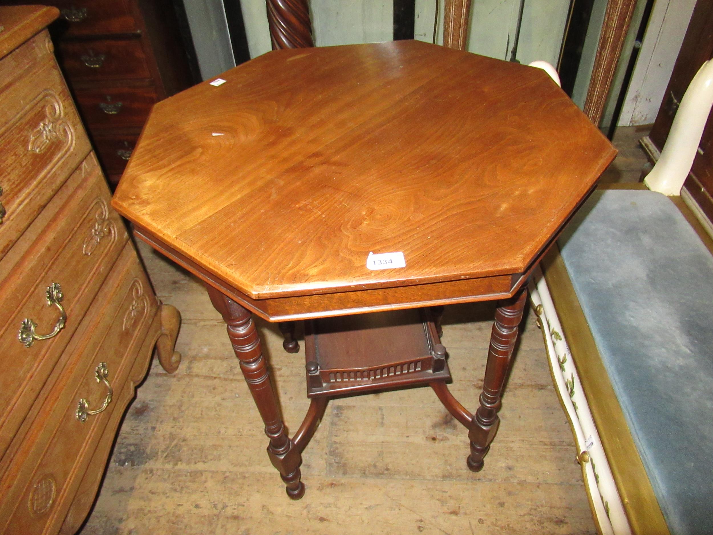 Late Victorian walnut octagonal two tier occasional table on turned supports