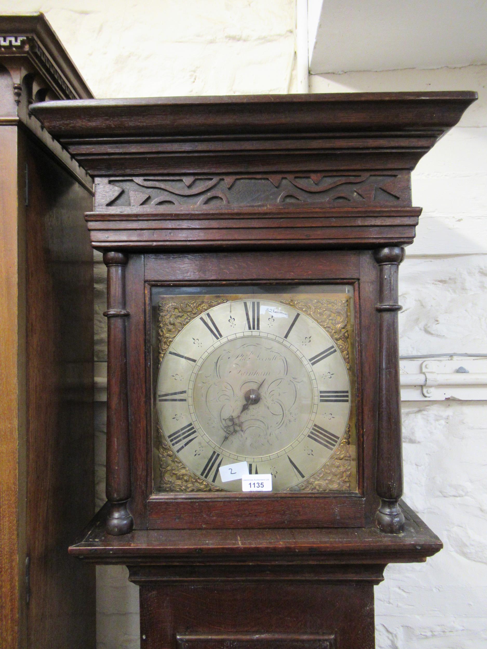 George III oak longcase clock, the square hood above rectangular panel door, the 10.5in brass and