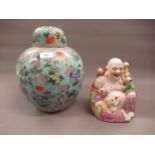 Large Chinese ginger jar and cover with floral decoration on a pale blue ground, printed red mark to