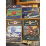 Box containing a collection of four Texaco diecast model aircraft including Steeman, Beechcraft etc.