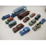 Group of eleven various early Dinky playworn diecast metal model vehicles, together with a Dinky