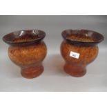 Pair of Monart baluster form orange glass vases (at fault), 9ins high Various large chips to base on