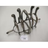 Unusual plated toast rack formed from stirrup and spurs, 10ins wide approximately