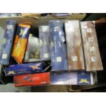 Black crate containing a collection of ten Corgi diecast model aircraft including Bristol Britannia,