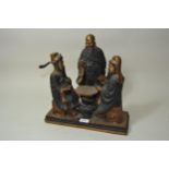 Large 20th Century Chinese gilt and dark patinated bronze group of three figures engaged in a