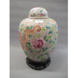 Large 20th Century Chinese jar and cover decorated with all-over polychrome dragons and flowers,