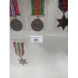 Group of four World War II medals including the Italy Star and the 1939 / 45 Star