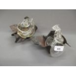 Pair of contemporary patinated metal and blown glass bottles, each approximately 4ins high