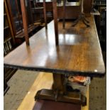 Large 20th Century oak refectory style dining table on octagonal chamfered end supports with