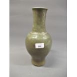 Chinese Celadon stoneware baluster form vase with shallow incised decoration and crackle glaze,