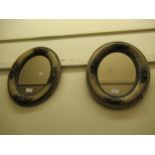 Pair of small French oval painted wall mirrors, 14ins x 10ins