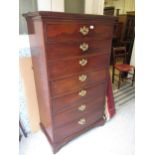 19th Century mahogany tall chest of seven drawers on a plinth base, 35ins wide x 18.5ins deep x 59.