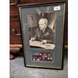 Arthur T. 'Bomber' Harris, signed photograph They are medal ribbons but do not believe they are his.
