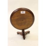 Miniature mahogany circular pedestal table with triform base, 9ins diameter