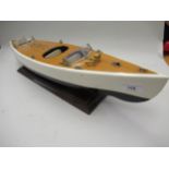 Well detailed painted wooden model of an Italian speedboat, 25ins long overall with display stand