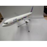 Travel agent's resin model of a Boeing 767 in Air 2000 First Choice livery, together with a quantity