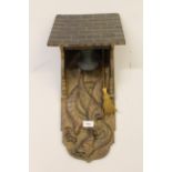 Carved oak bell bracket decorated with a dragon, possibly Black Forest region