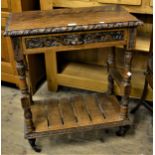 Small Victorian carved oak side table with single frieze drawer and undertier, 27ins wide